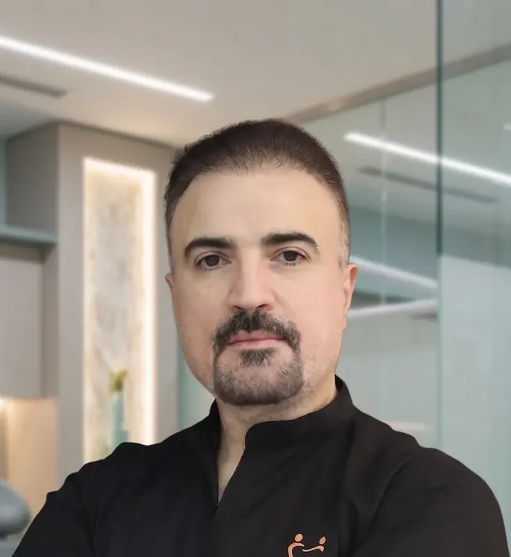 Dr. Moaiyad Pacha, specialist orthodontist, photographed at Manhal Medical Center in Dubai